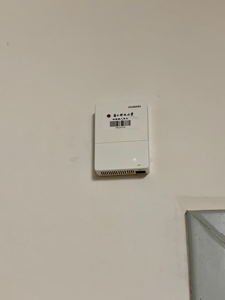 Wall-mounted wireless APs installed by SUSTech beside each dormitory door